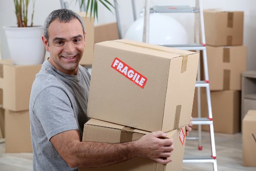 Professional movers preparing a South Kensington home move