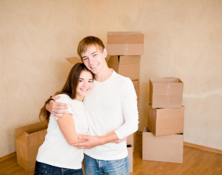 Local removals team handling furniture in a South Kensington property