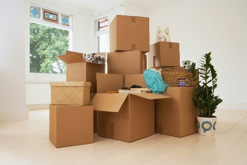 Local packing team preparing boxes in a South Kensington flat